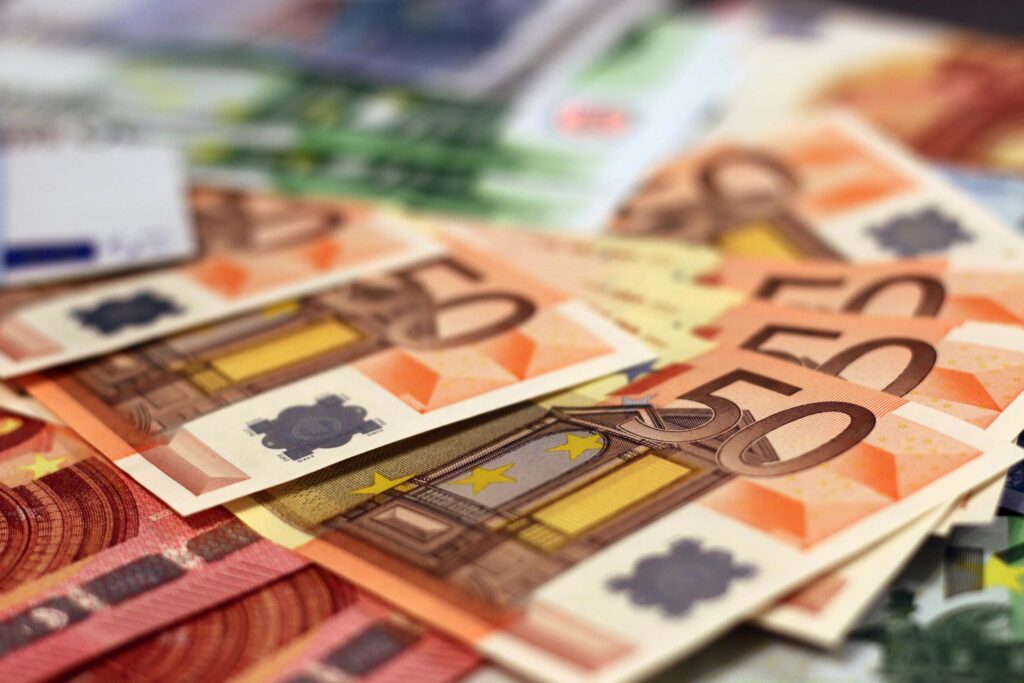Stack of 50 euro banknotes, representing wealth and finance concepts.