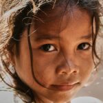 young girl, girl, child, cambodia, poor, view, portrait, street kid, face, expression, asian, disheveled, tousled, hair, cambodia, cambodia, poor, poor, poor, poor, poor