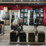 Elegant luggage display in a premium Doha airport shop, Qatar.